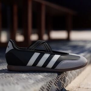 adidas Women’s Black Sneakers with White Three-Stripes